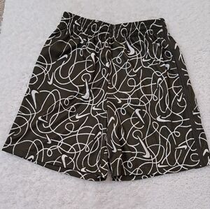 Nike shorts for boys, dark green and white
